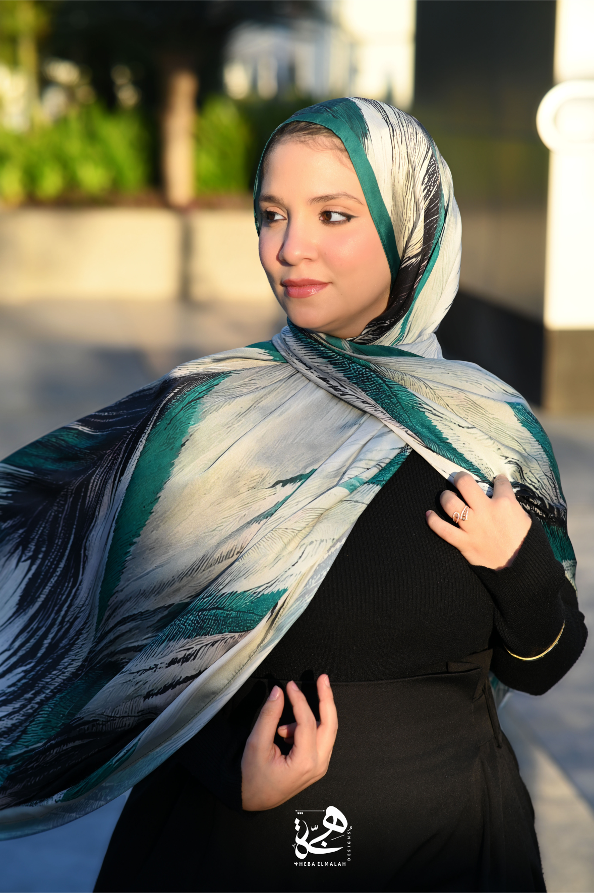 Woman wearing the Majesty silk satin hijab by Heba Elmalah Designs