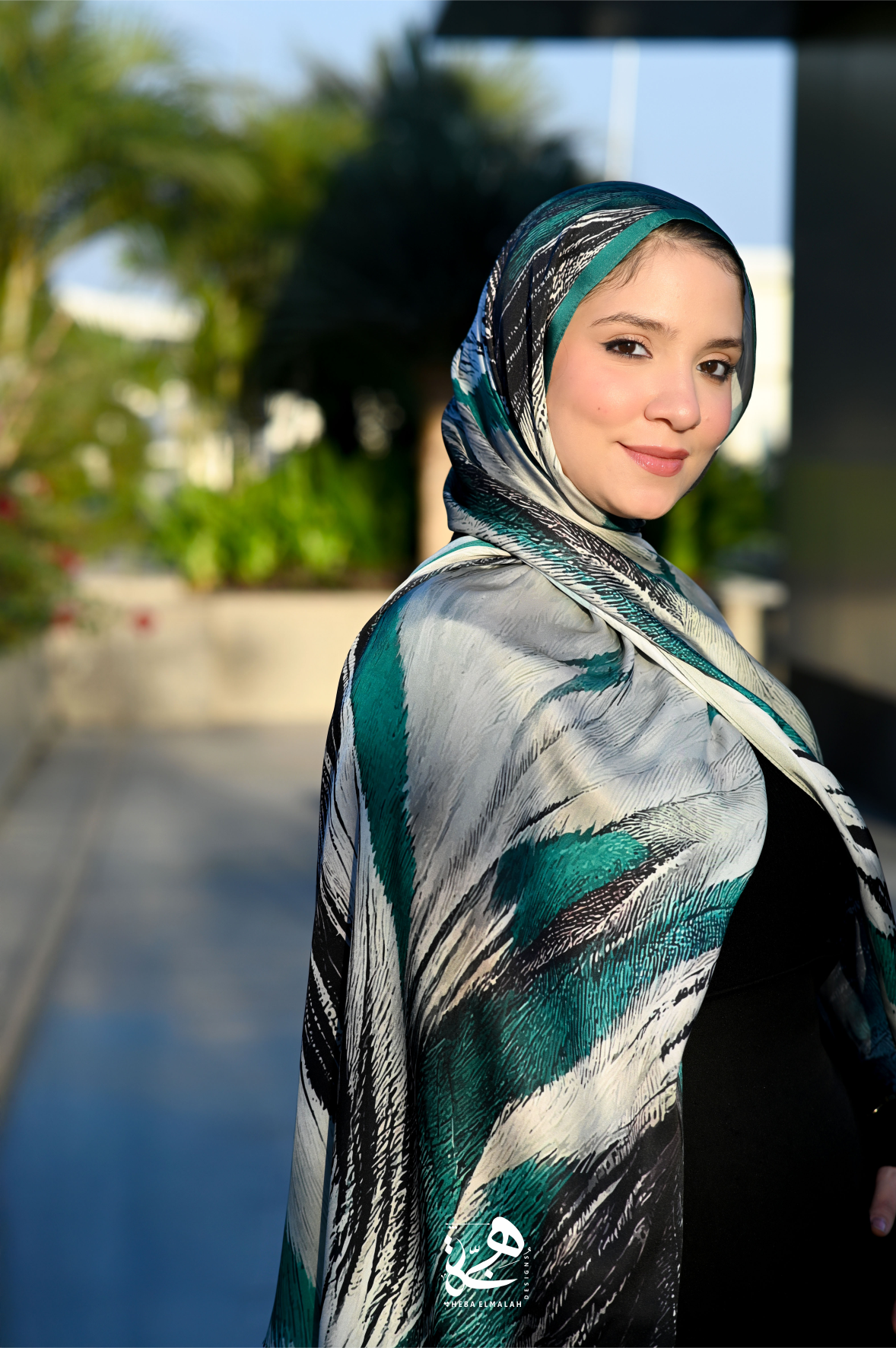 Side view of the Majesty silk satin hijab showcasing the printed pattern